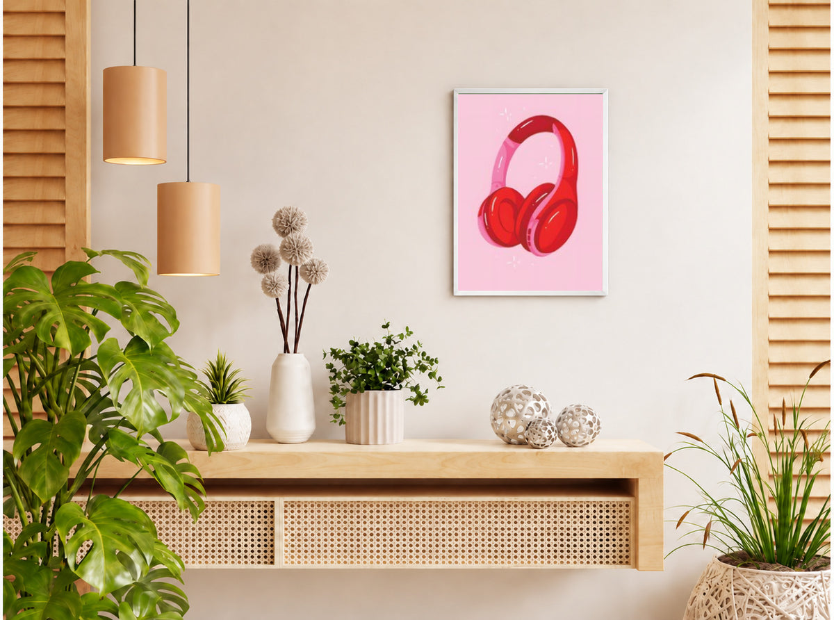 تنسيق توضيحي لبوستر Pink headphones بفريم في ركن منزلي