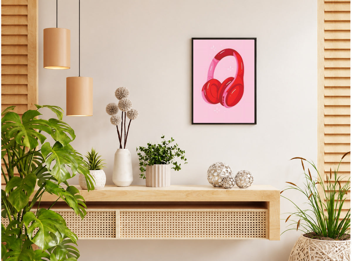 تنسيق توضيحي لبوستر Pink headphones بفريم في ركن منزلي
