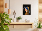 تنسيق توضيحي لبوستر Girl with a Pearl Earring smoking بفريم في ركن منزلي