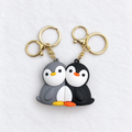 طقم ميداليات رابر Penguins من قطعتين من T33
